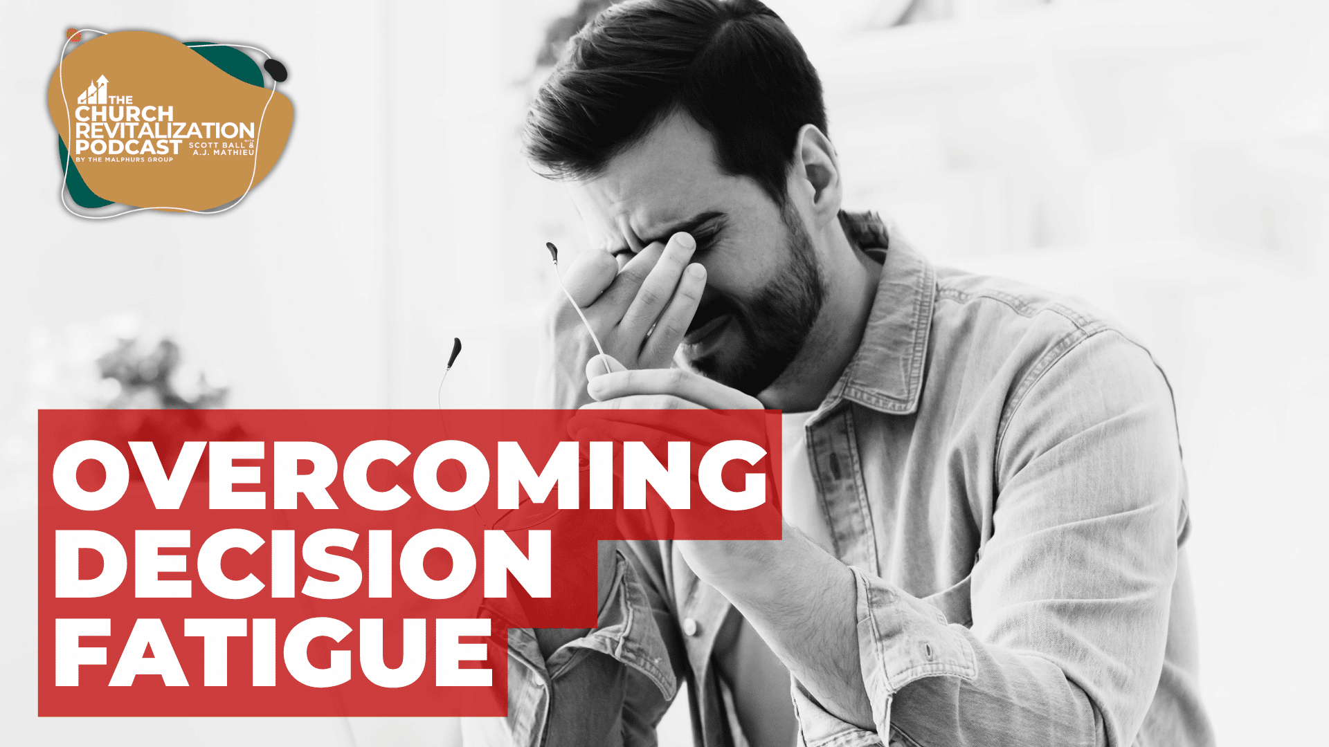 A man with a pained expression, rubbing his forehead, discussing decision fatigue in a podcast.